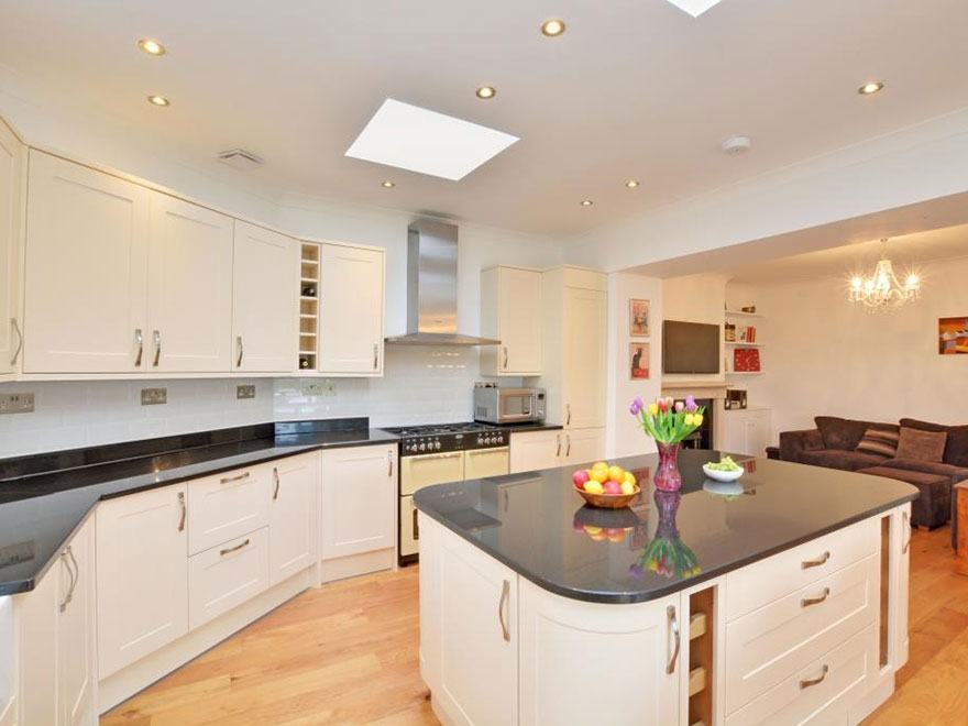 Ivory shaker kitchen and island at Horn Park Lane