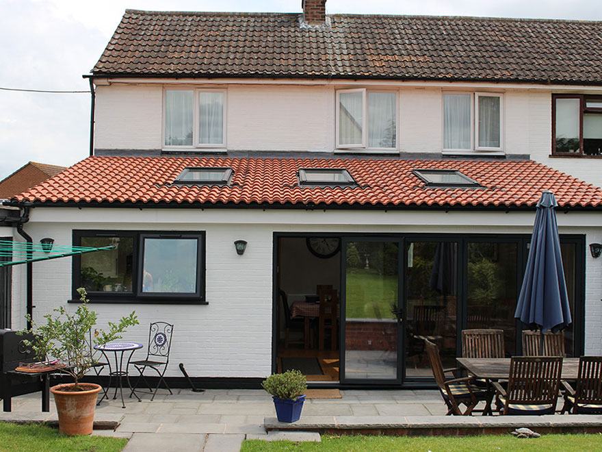 Rear extension with sliding doors and rooflights on a semi-detached house