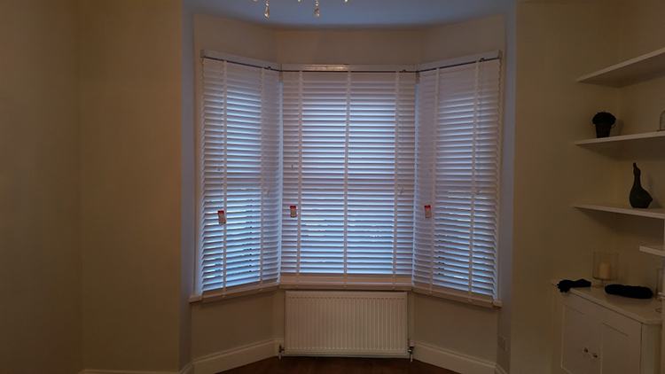 Bay window with shutters in the front room
