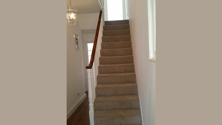 New carpeted staircase