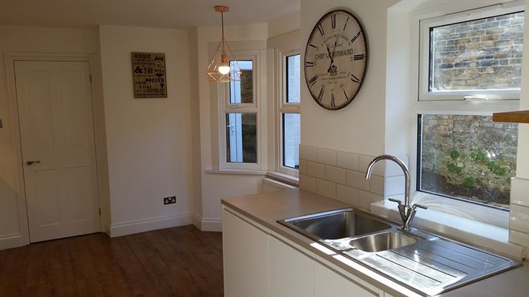 New white gloss kitchen at Lea Green