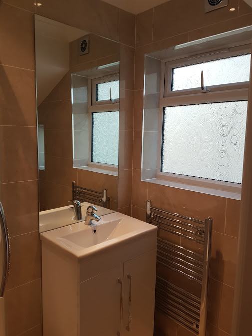 Refurbished bathroom with vanity unit
