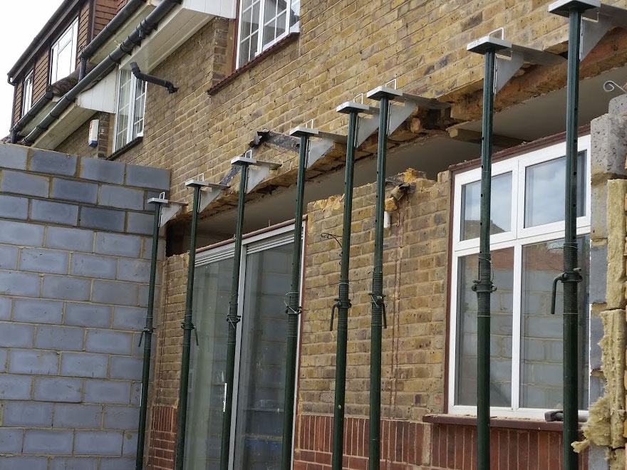 Acrow props supporting a rear wall before a steel beam goes in