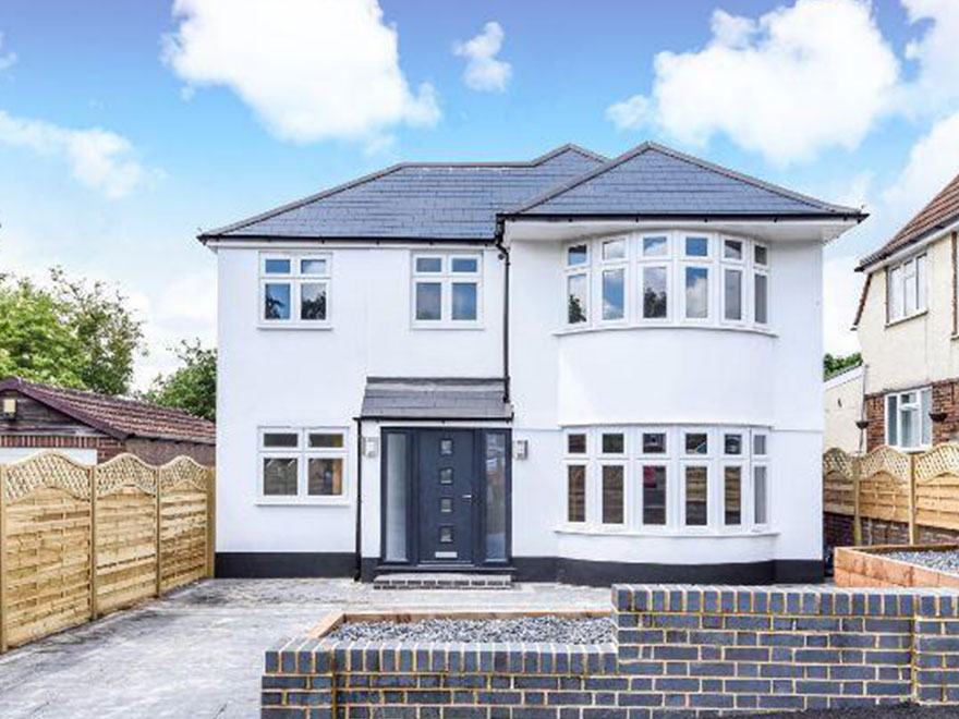 Five-bedroom new-build house finished in white render