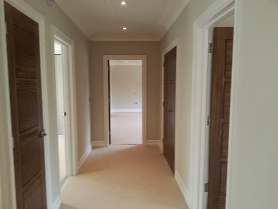 First-floor landing with oak doors